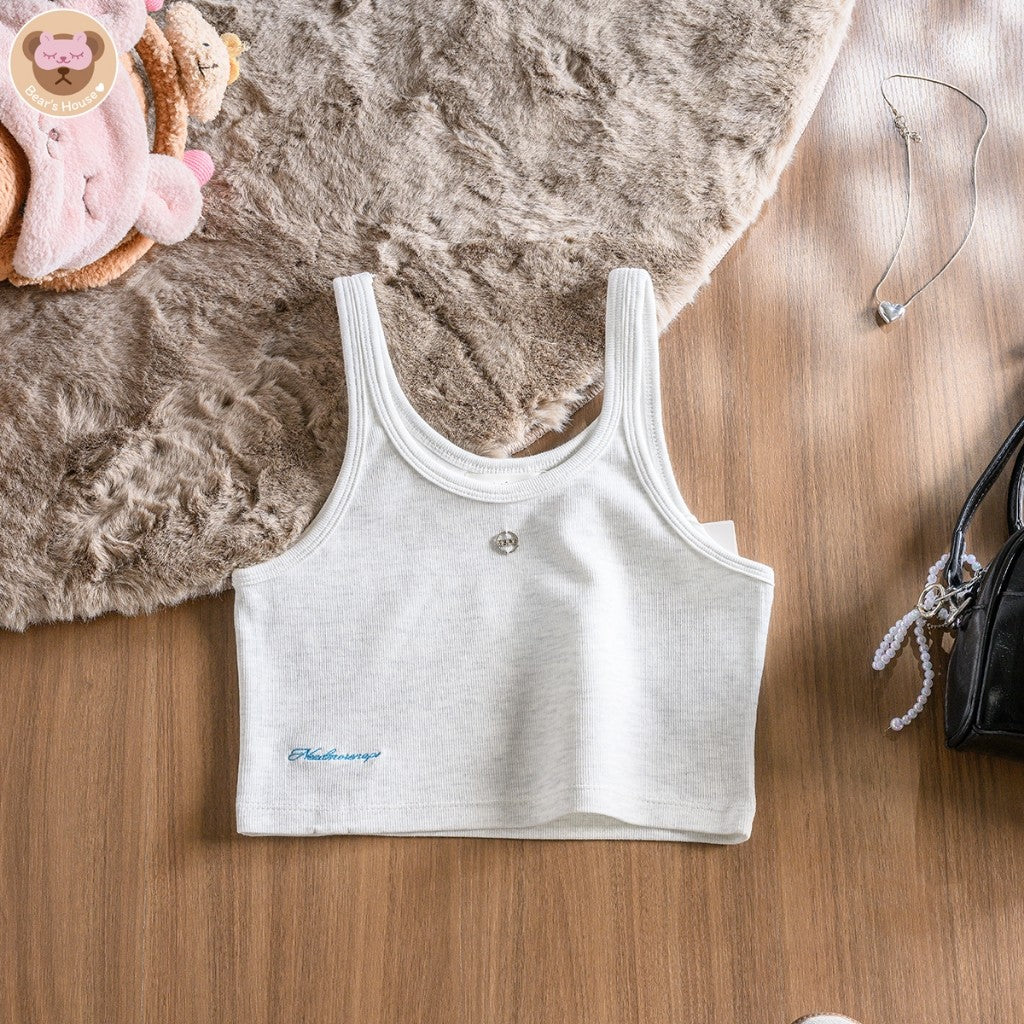 Pup up Tank Top เสื้อกล้ามสีพื้น ครอป ดีเทลติดอะไหล่เงิน ปลายเสื้อปักโลโก้ ผ้าร่องยืดหยุ่น